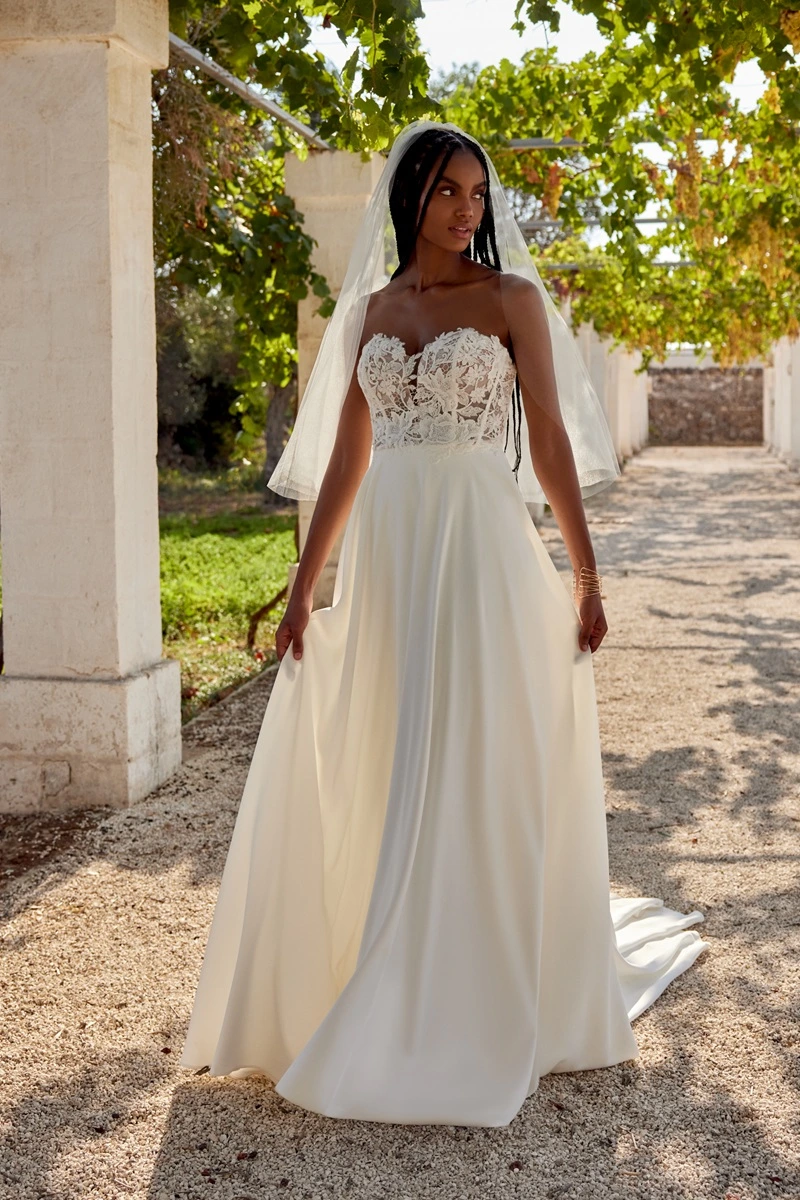 Wedding dress by Lillian West, style 66393 F